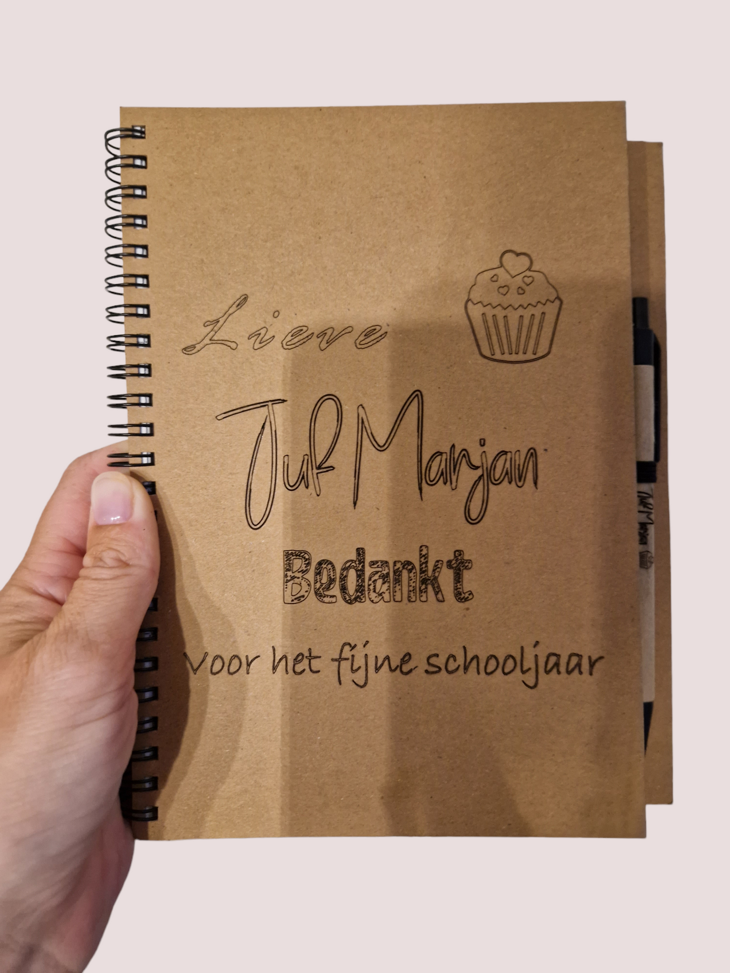 Notitieboekje met pen gepersonaliseerd